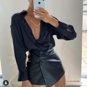 Zara faux leather skort size XS black. Worn a few times.